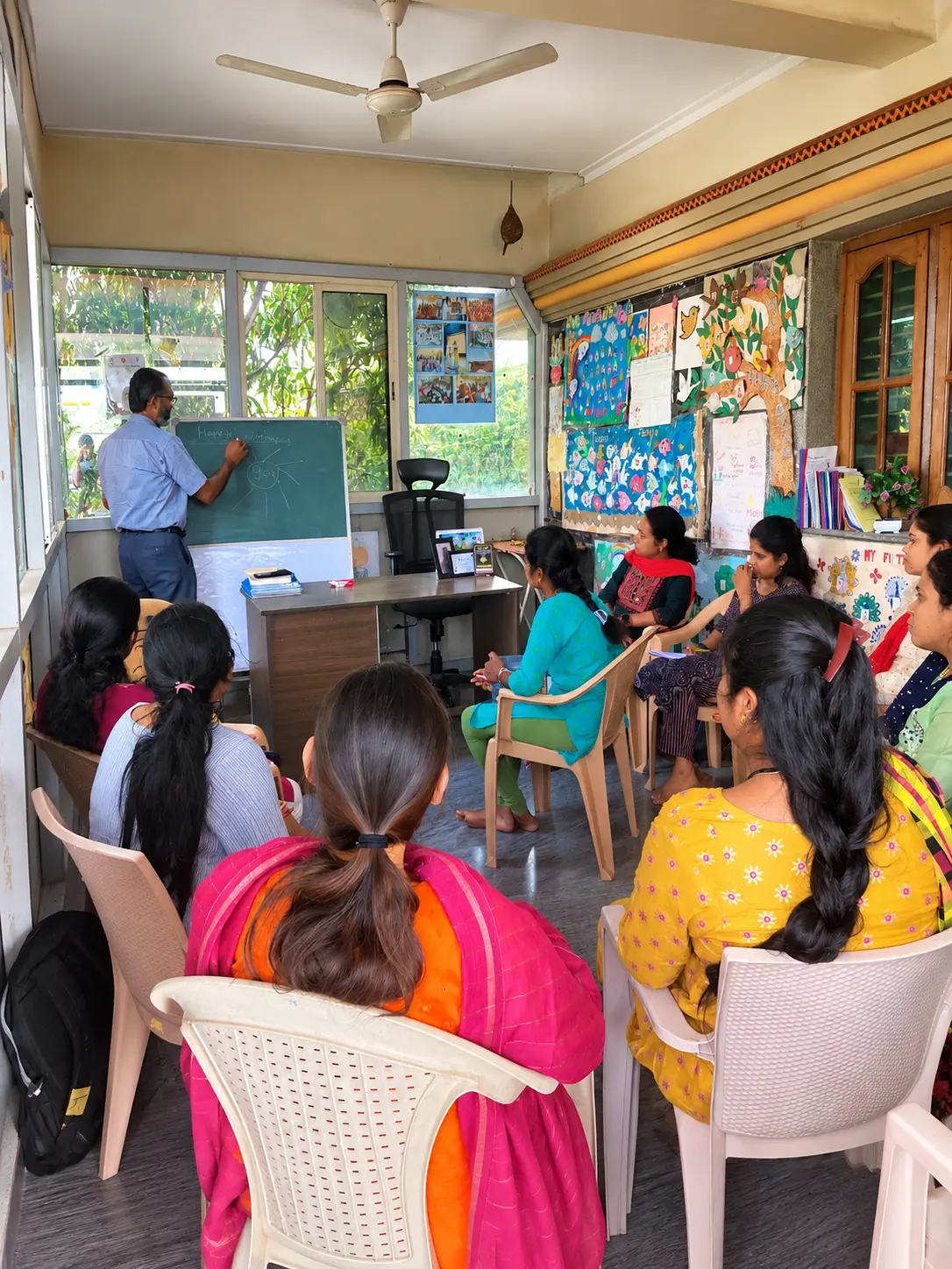 Teacher with young children in a classroom